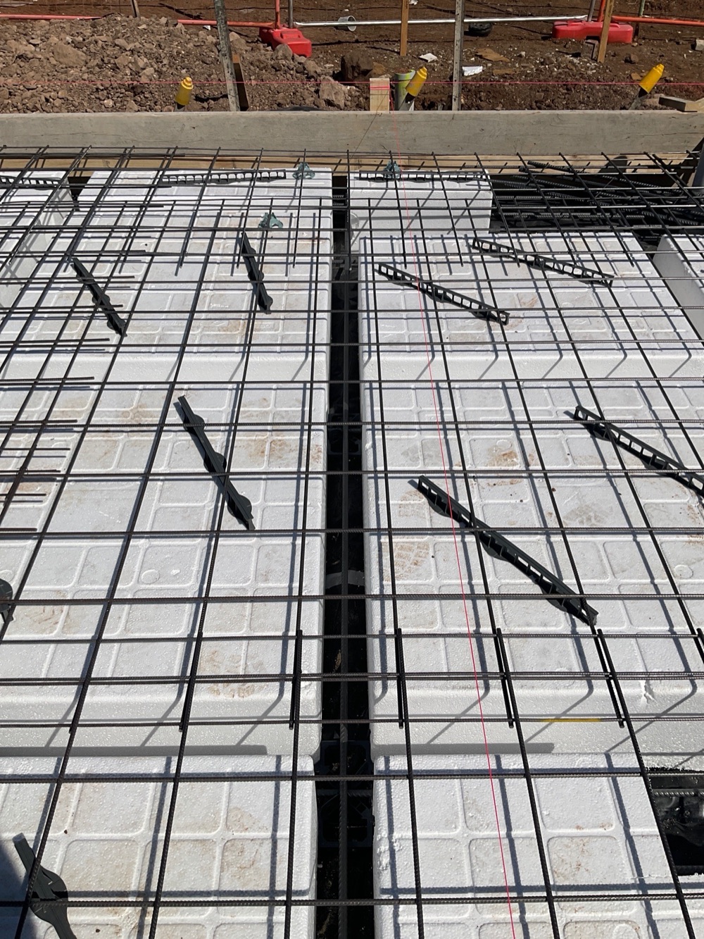 Beam width inconsistent along its length, recorded during a slab pre-pour inspection in Fraser Rise, 4 km from Rockbank